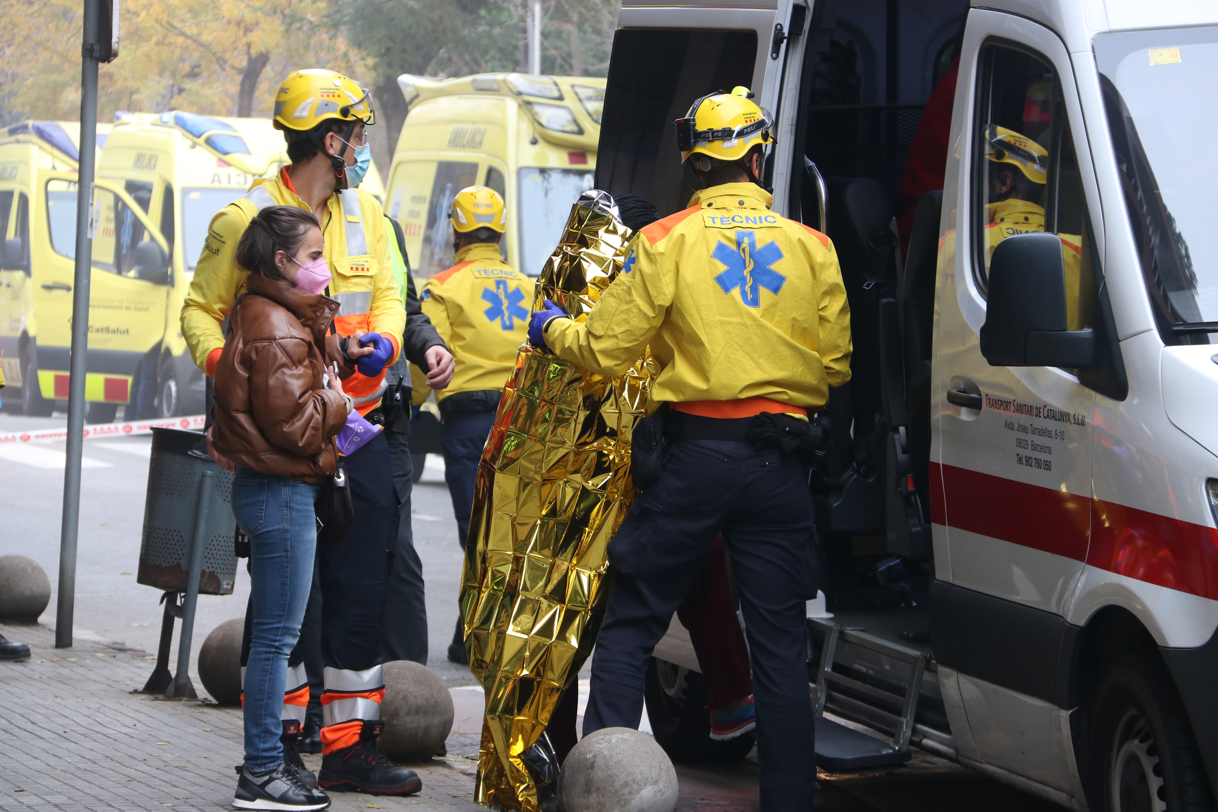 Medical emergency services aid victims of the collision between two trains at the Montcada i Reixac Manresa station, just north of Barcelona, on December 7, 2022