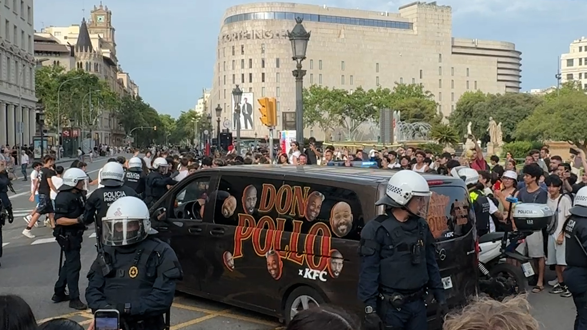 Police escorted Don Pollo away from the crowd