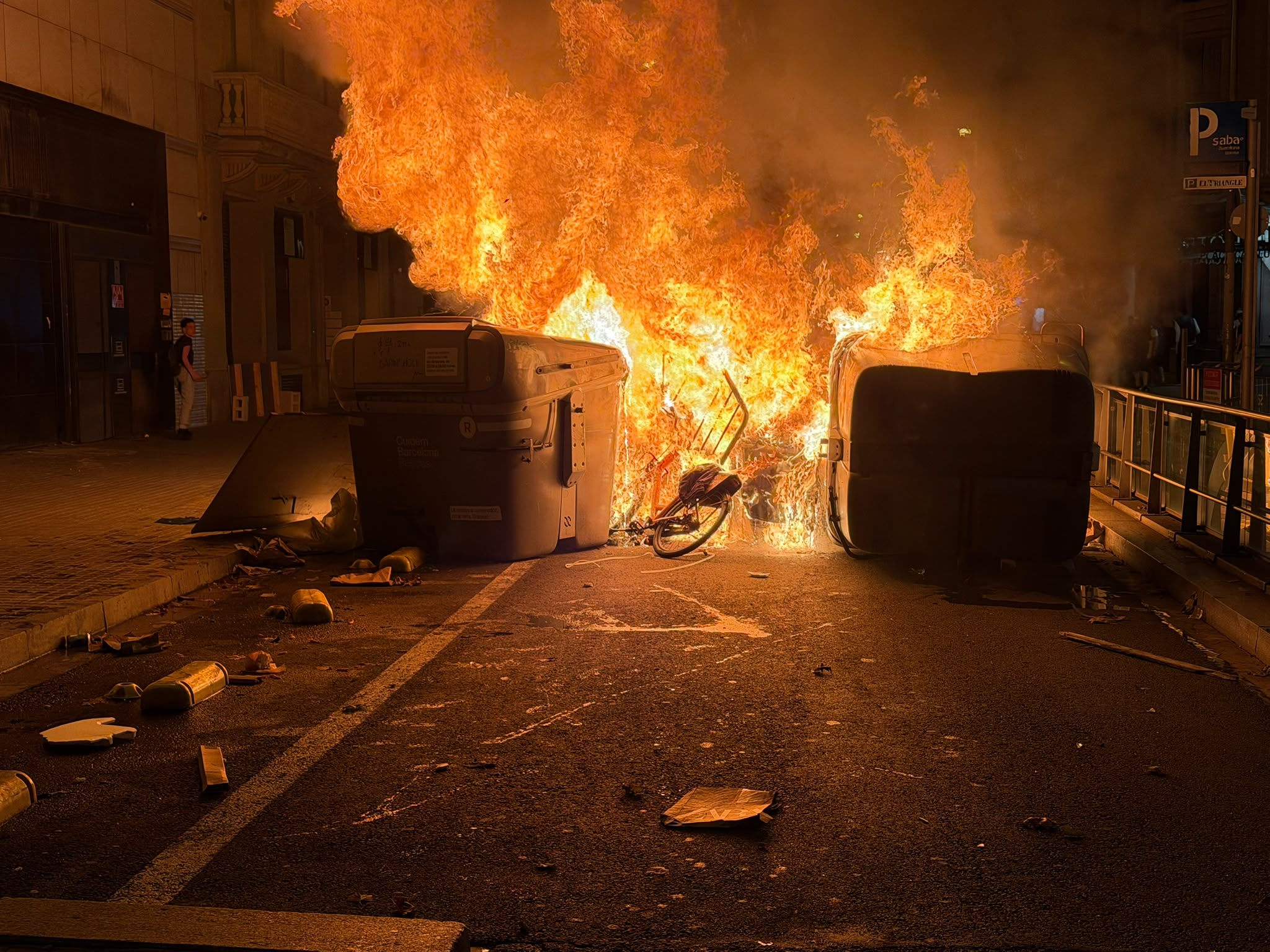 Burning rubbish containers on Passeig de Gràcia