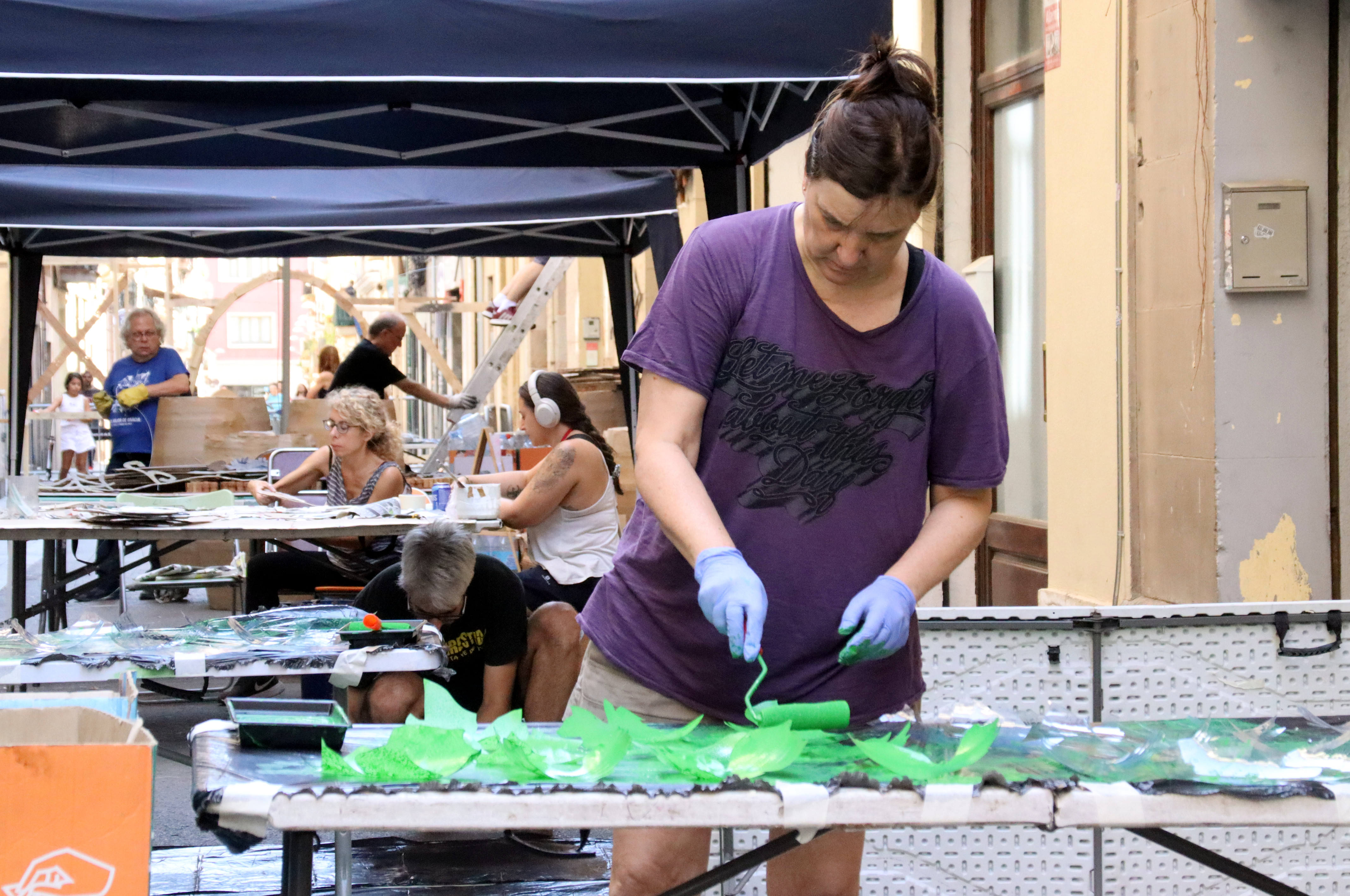 Residents working on decorations to have everything ready for August 15.