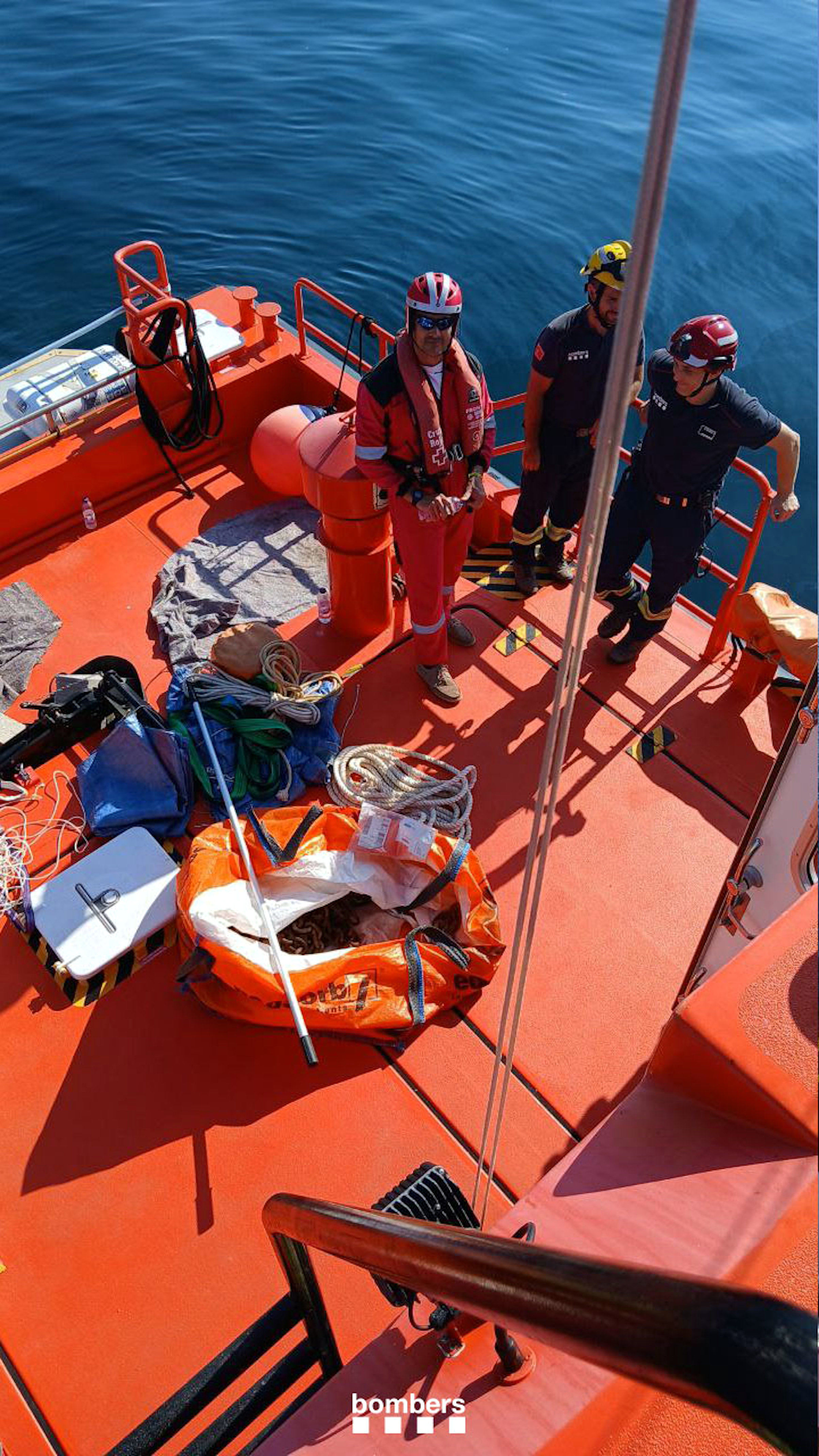 Emergency services working on the fuel leak from the sunken fishing boat