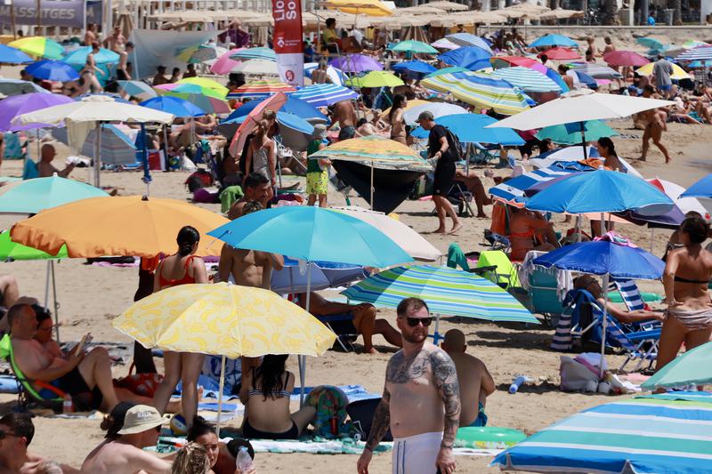 A packed beach in Sitges