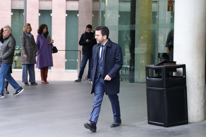 Catalan president Pere Aragonès leaves the court after testifying as a victim of the Pegasus spyware scandal, December 2023