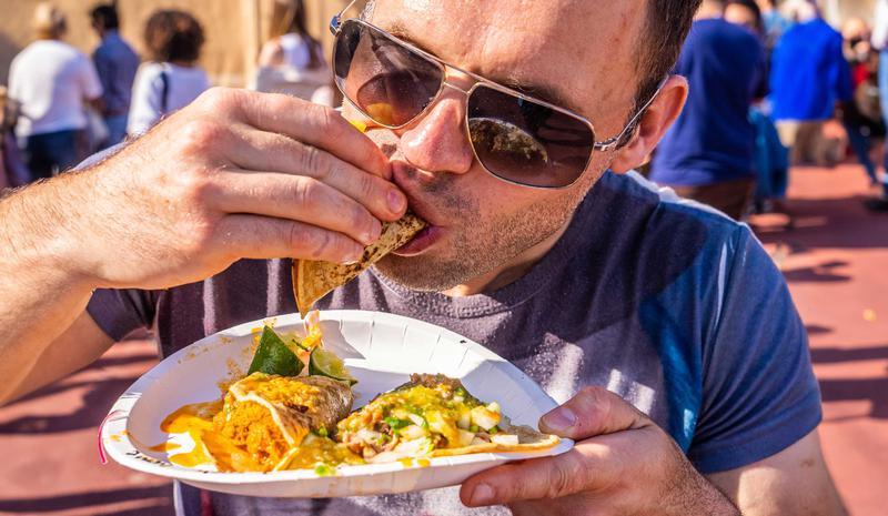 A taco fan enjoys one of the offerings at the last Taco Fest Barcelona