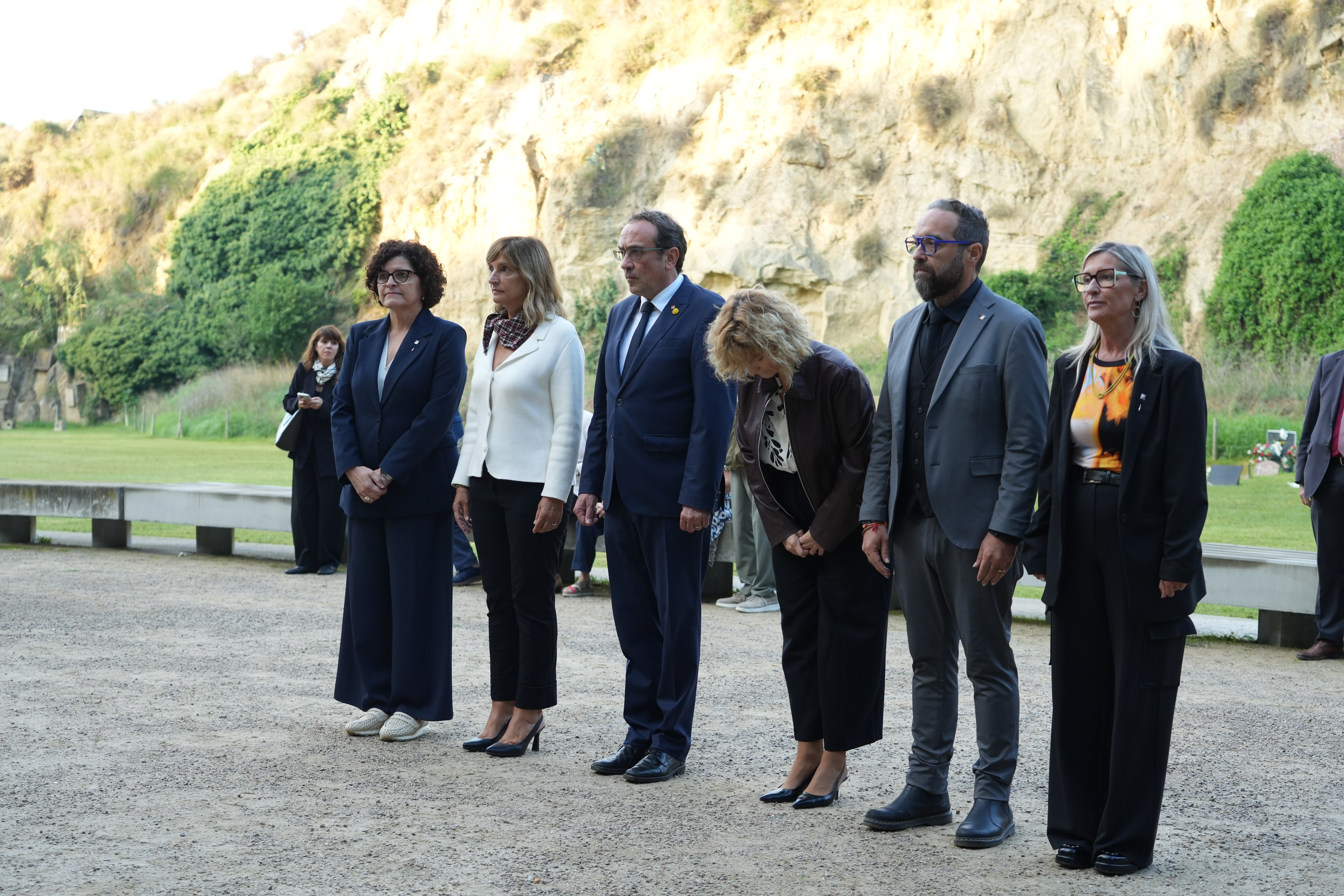 Catalan Parliament speaker Josep Rull and members of the parliamentary bureau lay flowers at the grave of Lluís Companys, the Catalan president executed by Franco's regime, at Montjuïc Cemetery