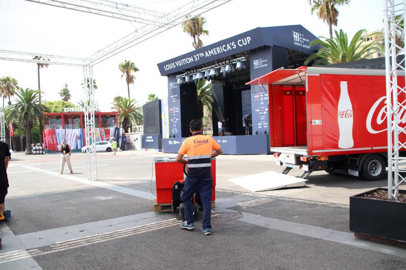 A worker at the America's Cup Race Village in Moll de la Fusta