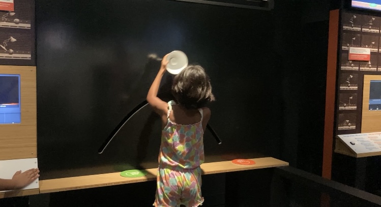 Visitor making their own stop motion film in the Animation section of 'The Science Behind Pixar' exhibition