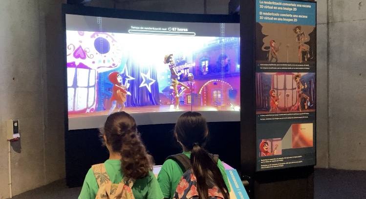 Two visitors taking a look at the Rendering stage of animation in action