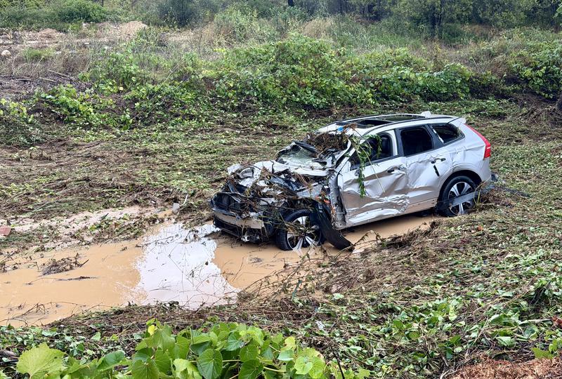 The car belonging to the man who died after being swept away by the stream in Olivella.