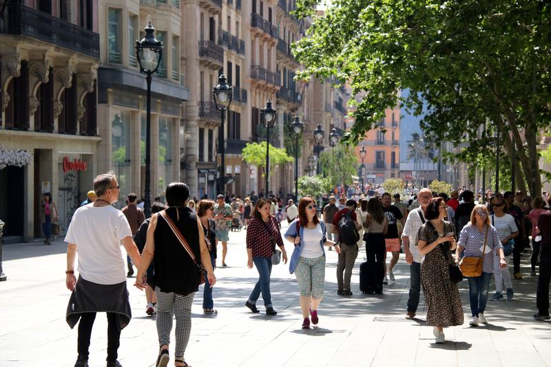 Barcelona's commercial street Portal de l'Àngel on a sunny day