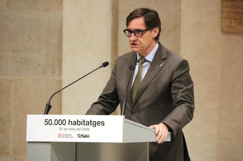 Catalan president Salvador Illa speaking at the government headquarters building