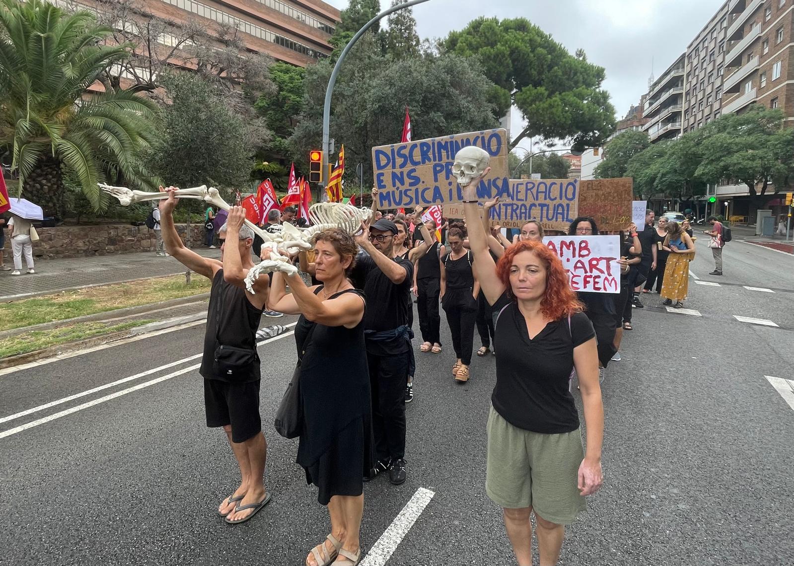 Teachers hold a protest outside the department of education
