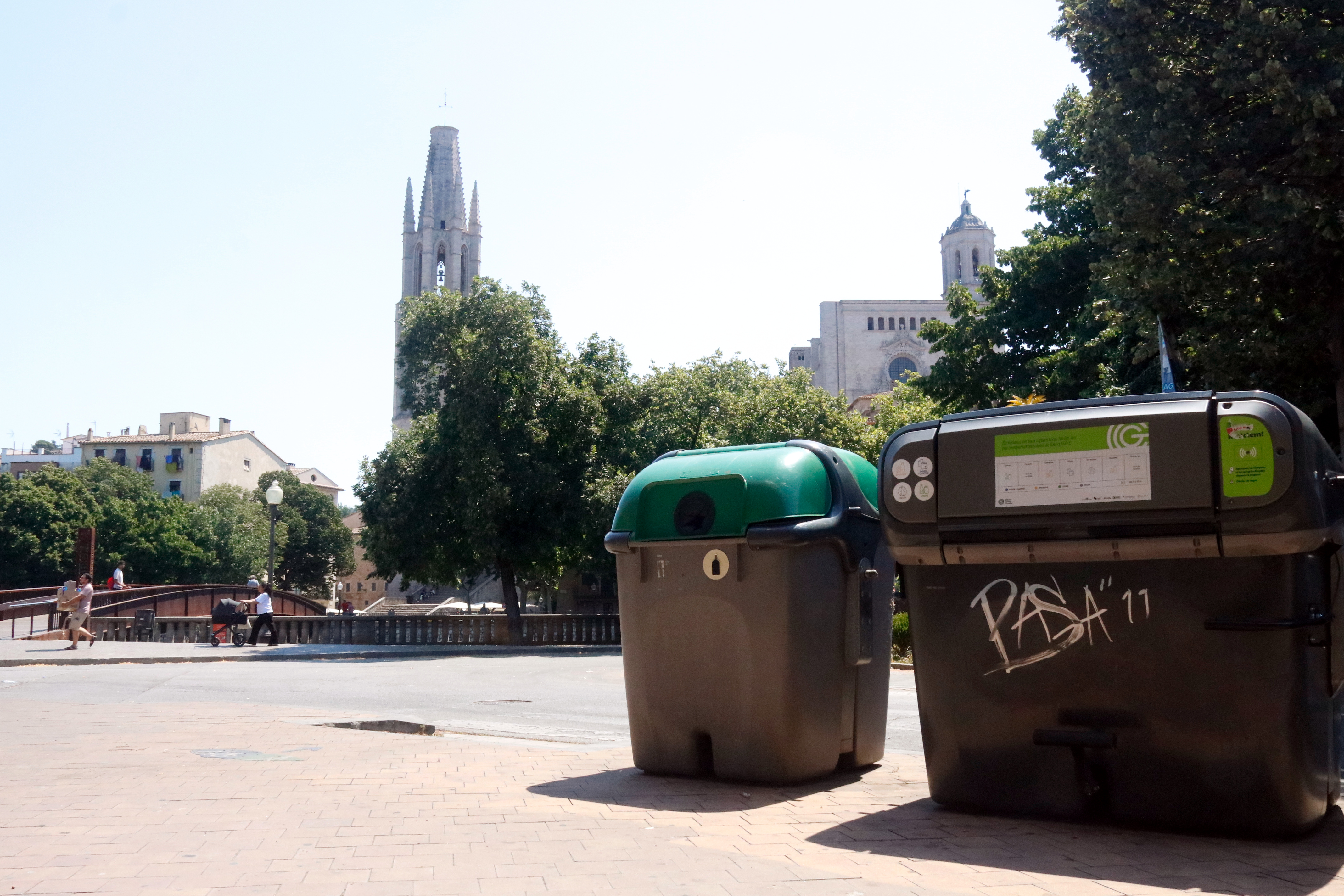 The green containers are used to recycle glass and return to Girona's streets after a change in the cleaning system