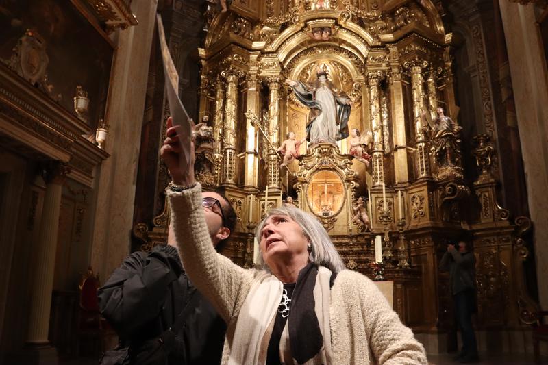 Curator Ana Ordóñez shows a journalist the restoration work on the church of Sant Sever in Barcelona, just before the official reopening of its doors.