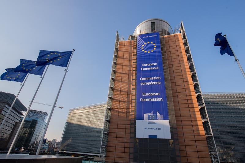 European flags in front of the European Commission Berlaymont building in Brussels