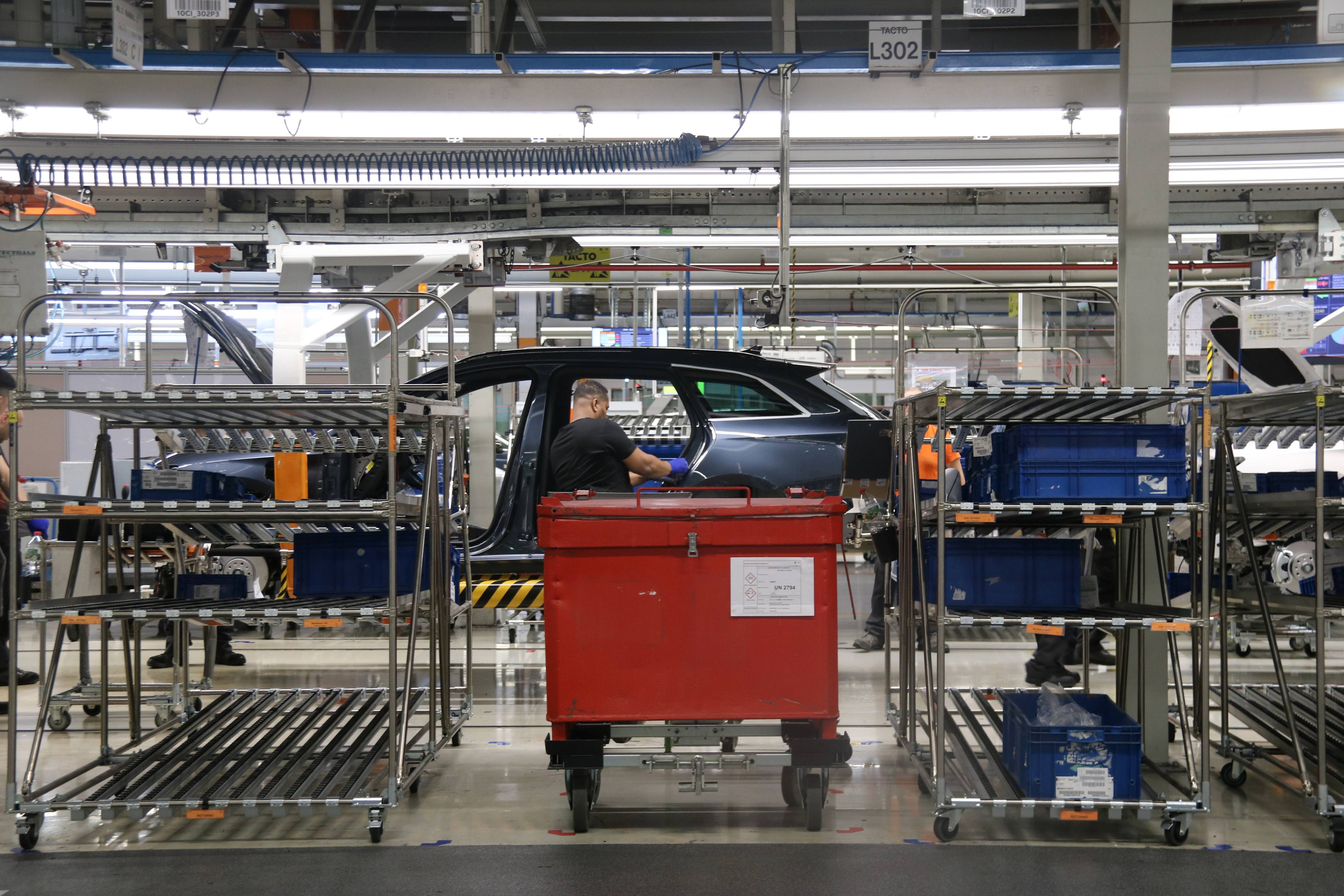 A worker on the car assembly line at the Seat-Cupra plant in Martorell