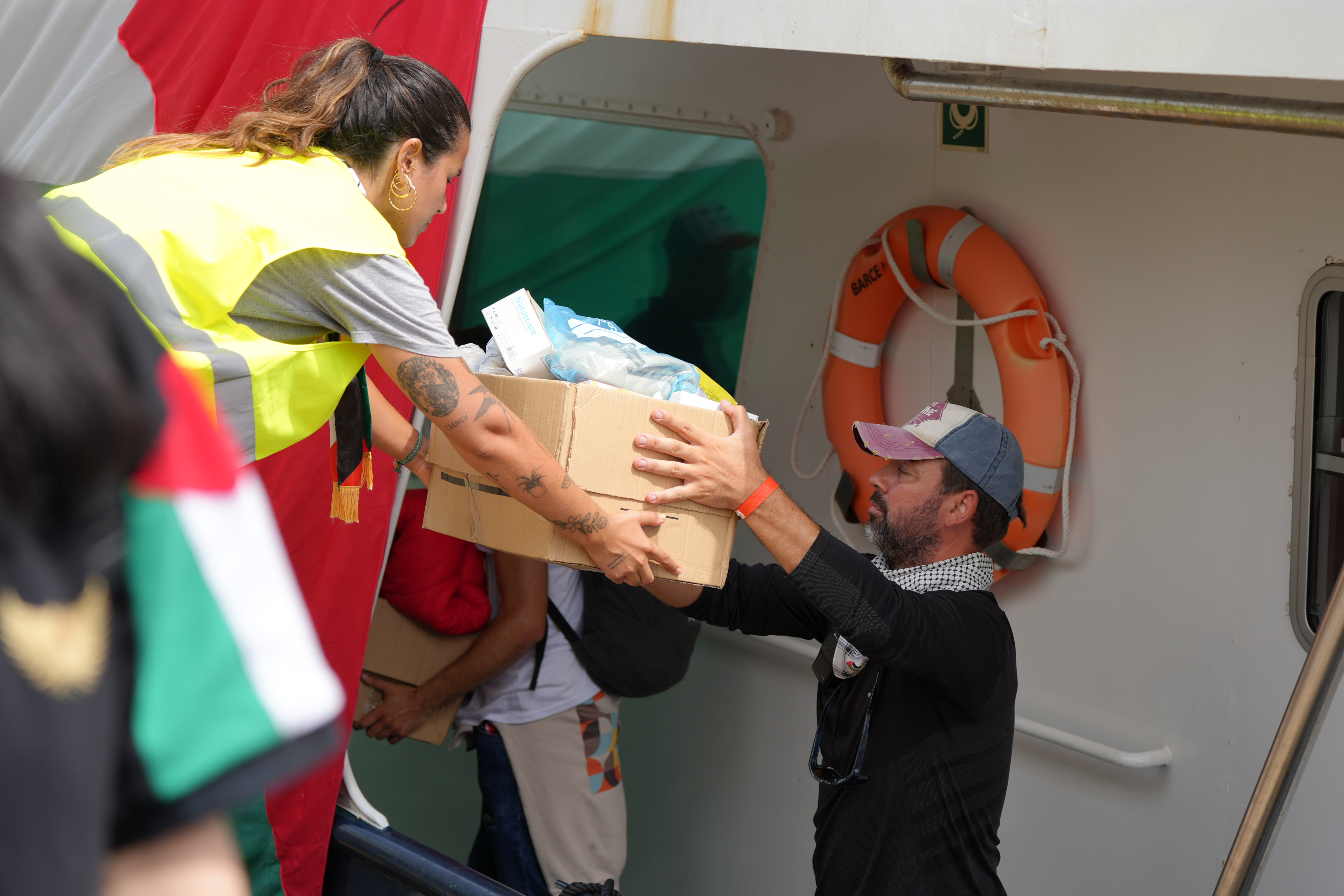Loading medical supplies onto one of the Global Sumud Flotilla vessels
