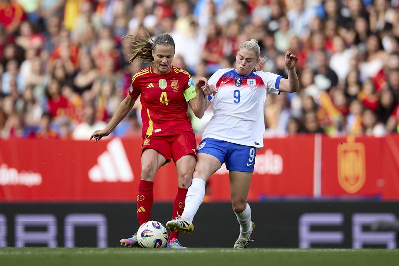 England's Alessia Russo challenges Spain captain Irene Paredes