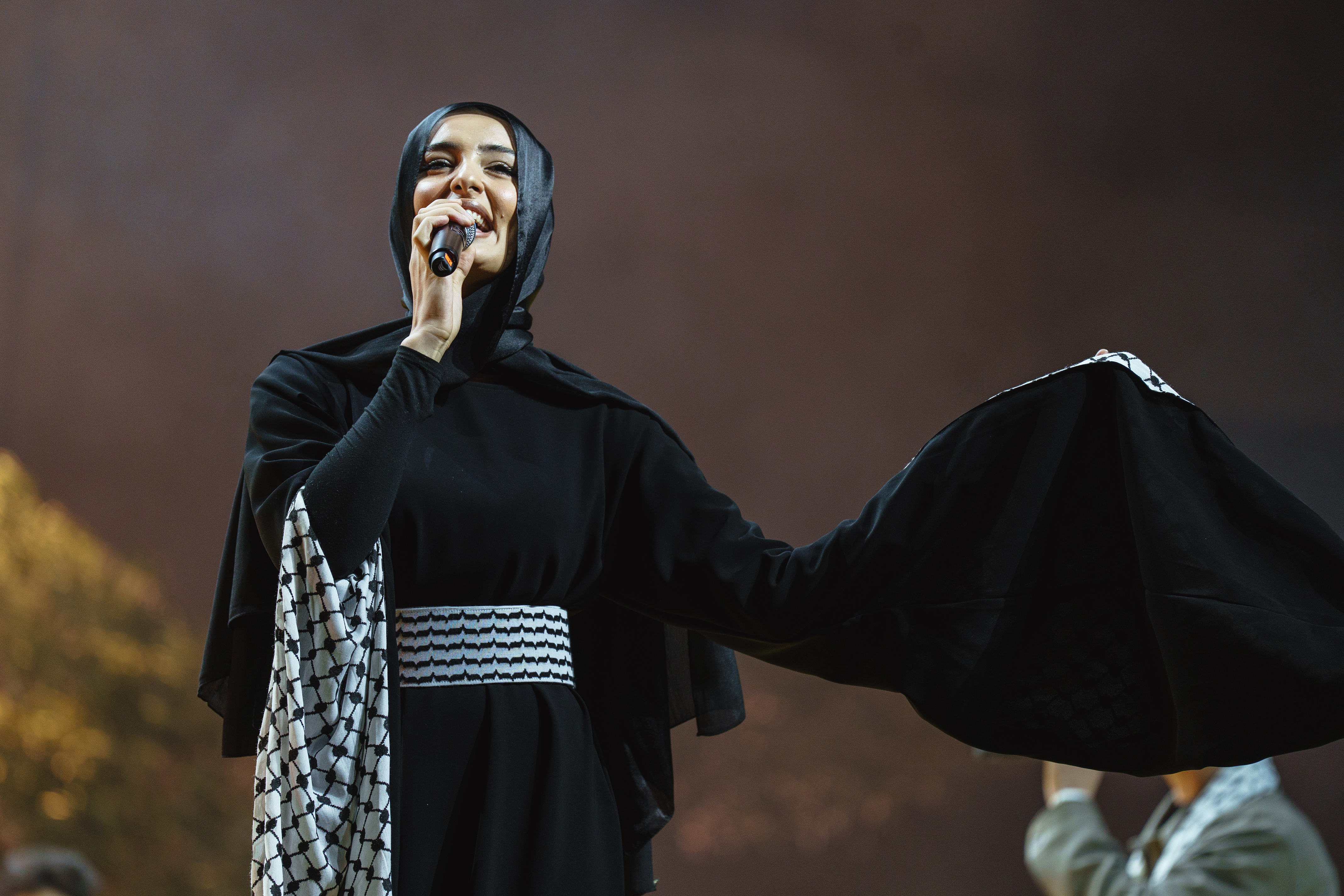 Sol Band perform at the solidarity concert for Palestine at Barcelona's Palau Sant Jordi