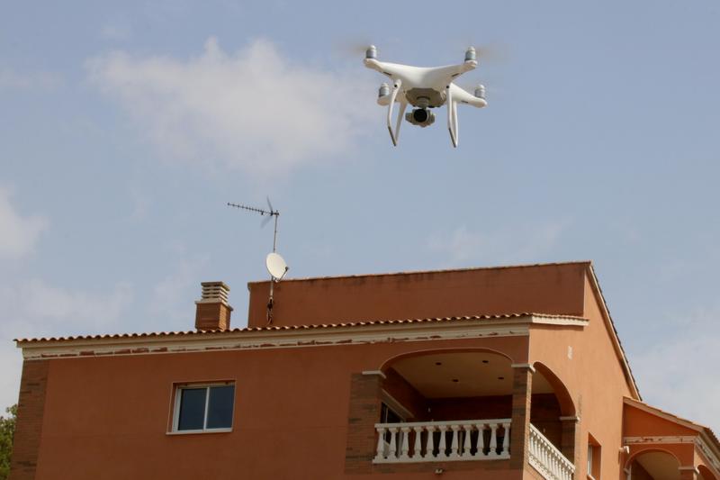A drone flying over a house in Calafell
