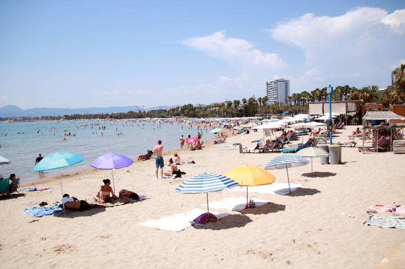 People sunbathing on the Salou beach