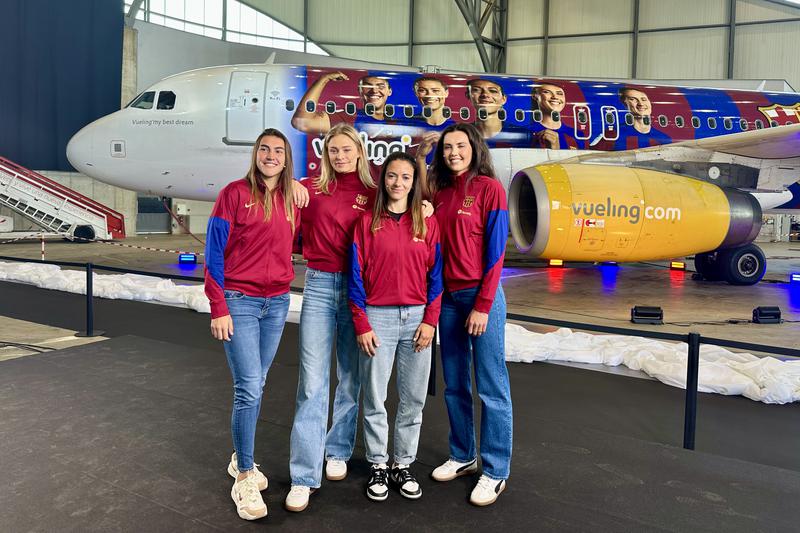 FC Barcelona women's team players Aitana Bonmatí, Fridolina Rolfö, Ingrid Engen, and Patri Guijarro in front of Vueling airplane branded with their faces on April 25, 2024
