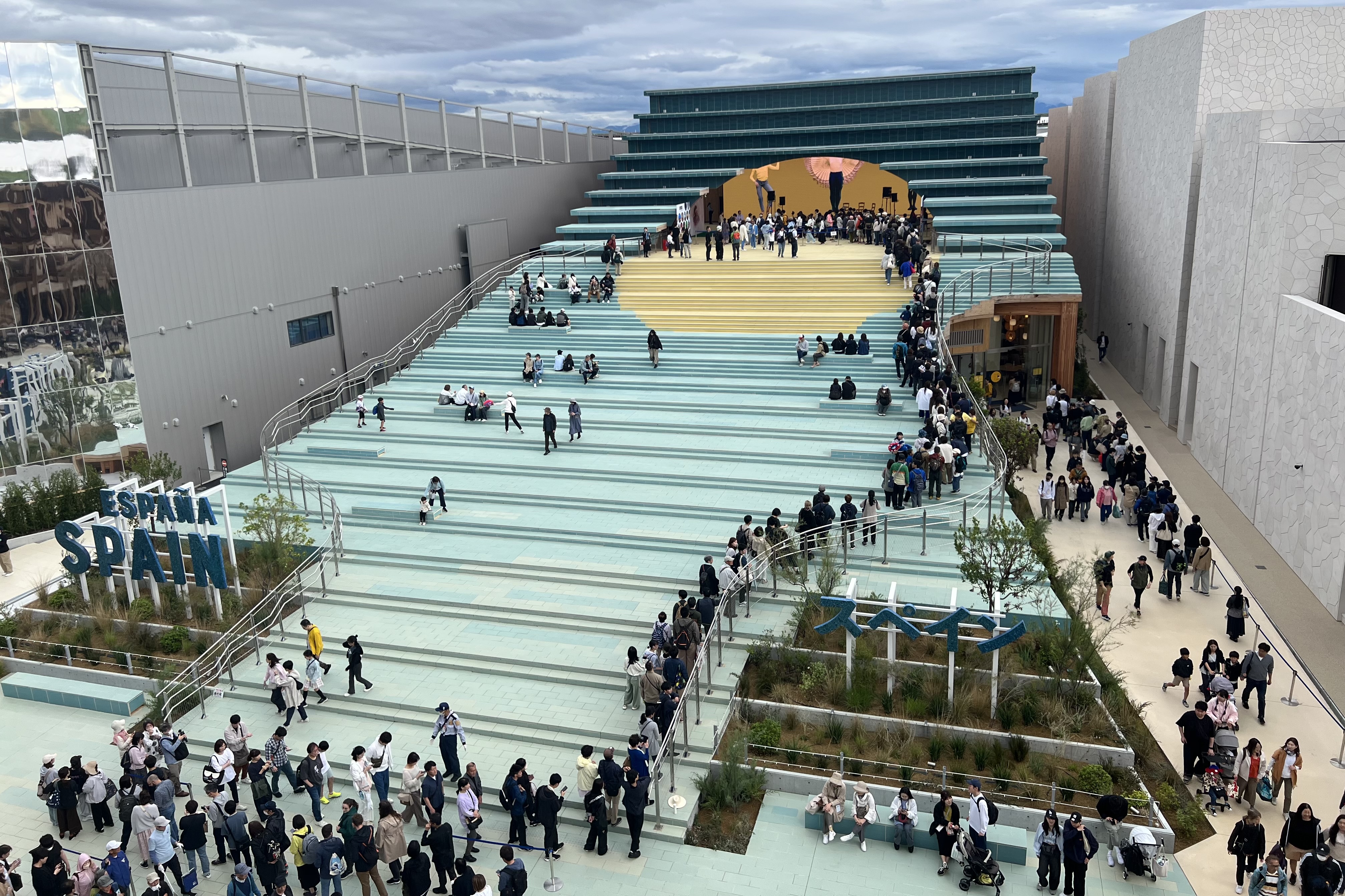 People queue to enter the Spanish Pavilion at the Expo 2025 in Osaka, Japan