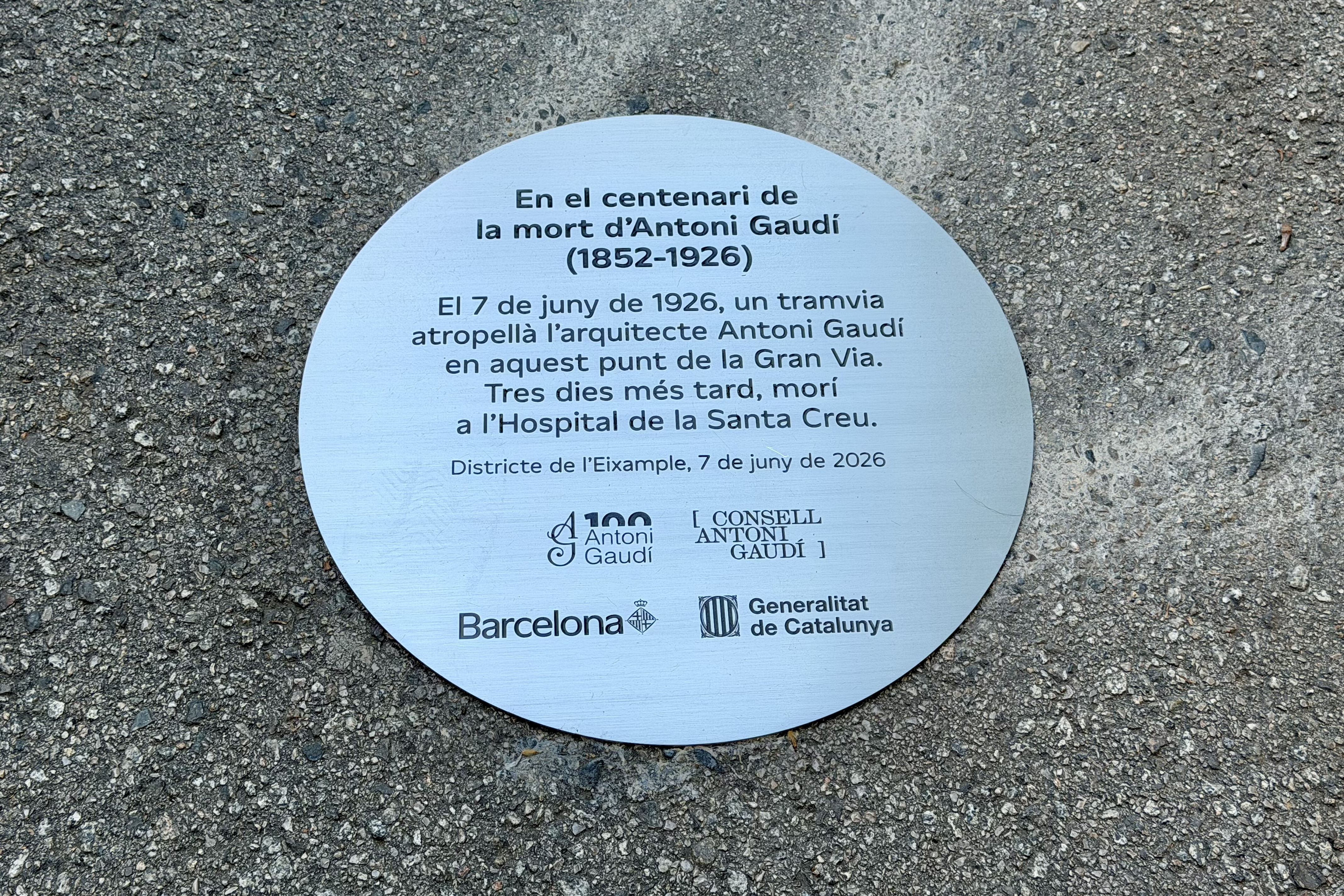 Commemorative plaque installed where Antoni Gaudí was hit by a tram exactly one hundred years ago, on Gran Via in Barcelona.