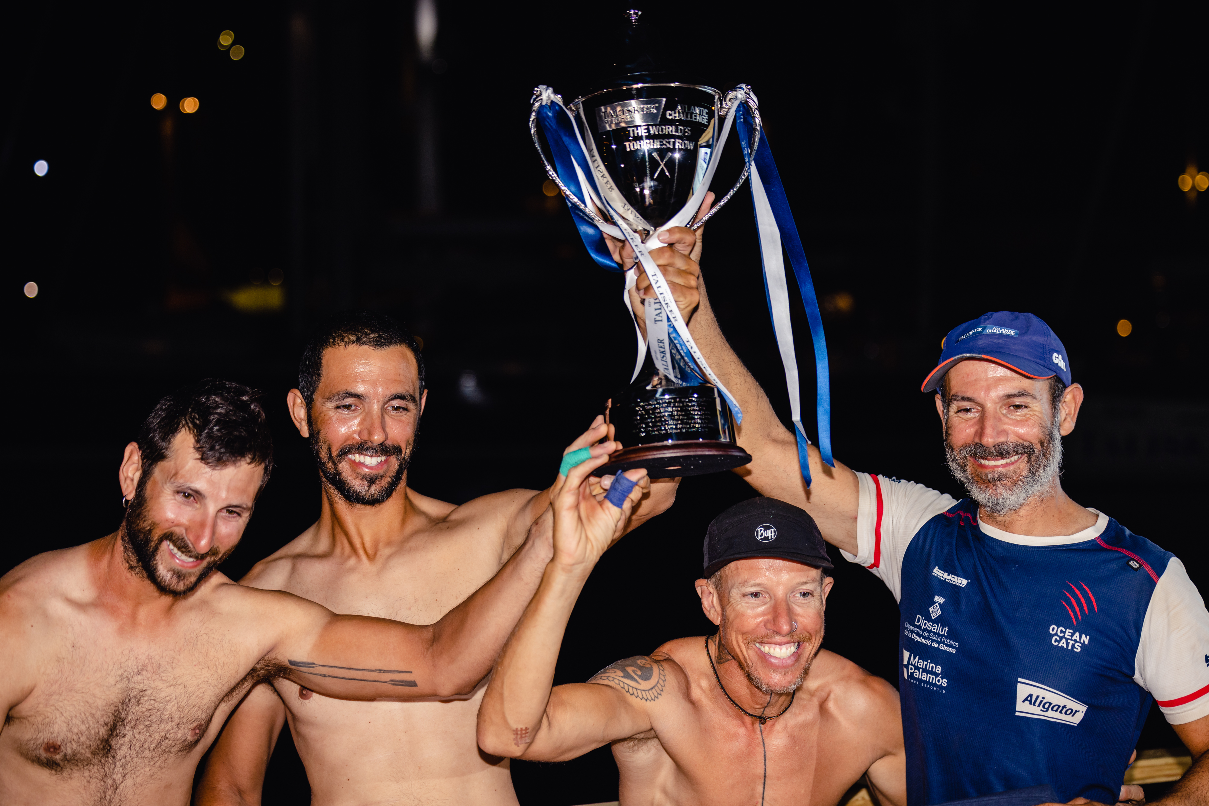 Ocean Cats rowers with the MacAskill Trophy after winning the Talisker Atlantic Challenge 2022 as they reached Antigua and Barbuda in 31 days, 17 hours, and nine minutes