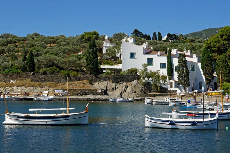 Dalí's house in Portlligat with some boats in front