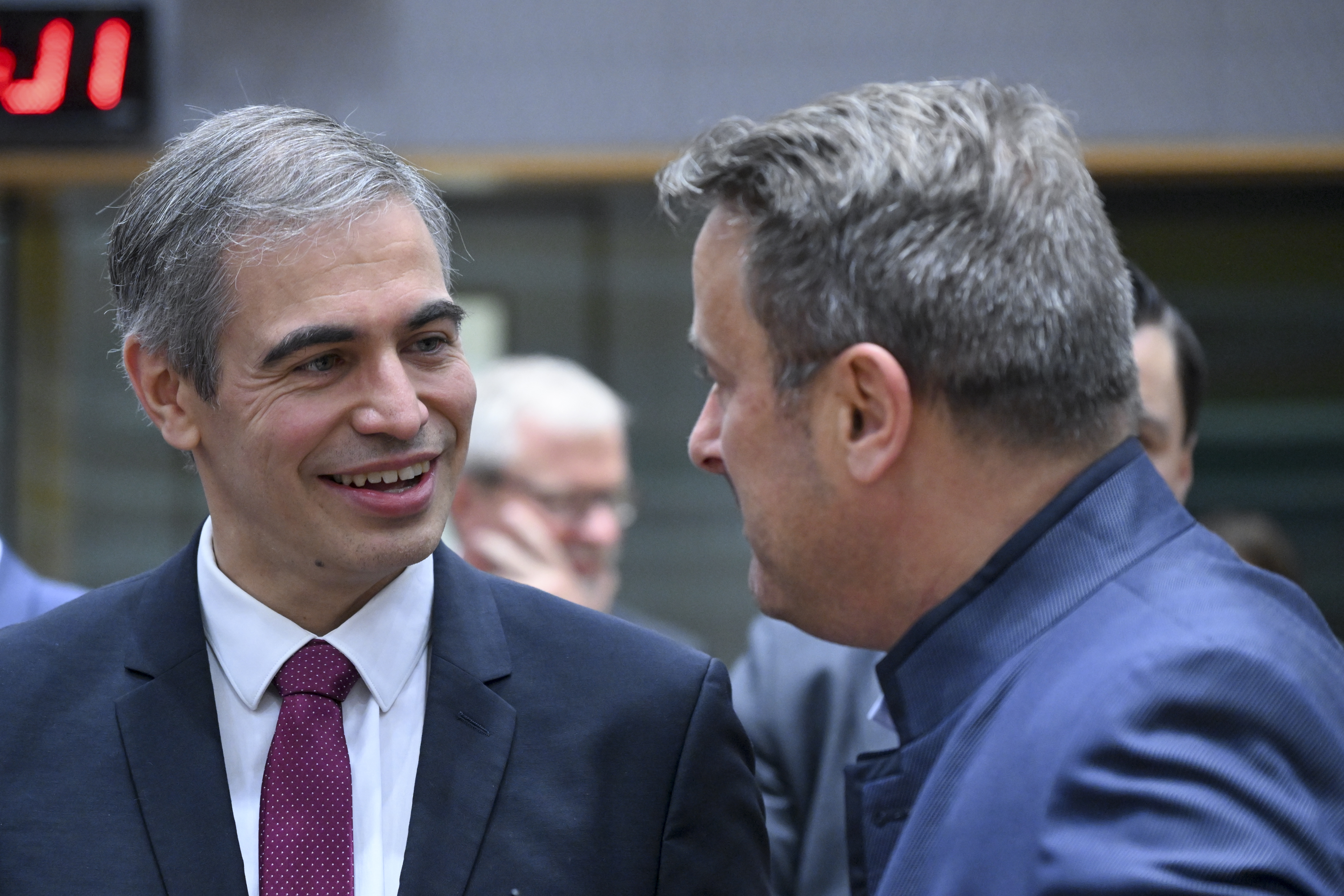 Spain's Secretary for the European Union, Fernando Mariano Sampedro Marcos, speaks with Luxembourg minister for Foreign and European Affairs, Xavier Bettel, on July 18, 2025 in Brussels