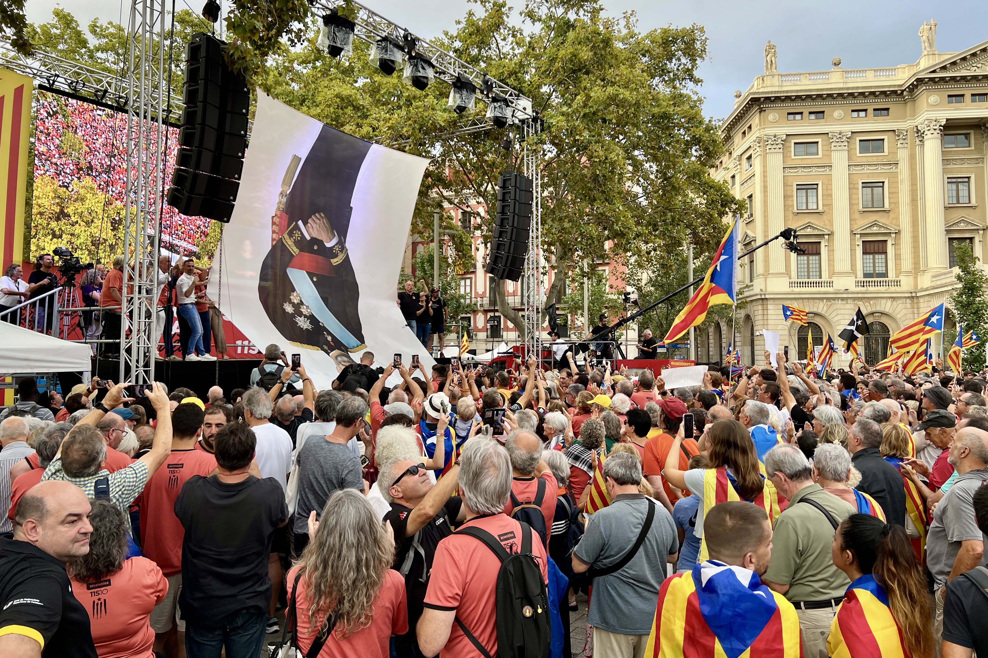 A large portrait of Spain's King Felipe VI is displayed upside down after a demonstration in favor of Catalan independence on September 11, 2025