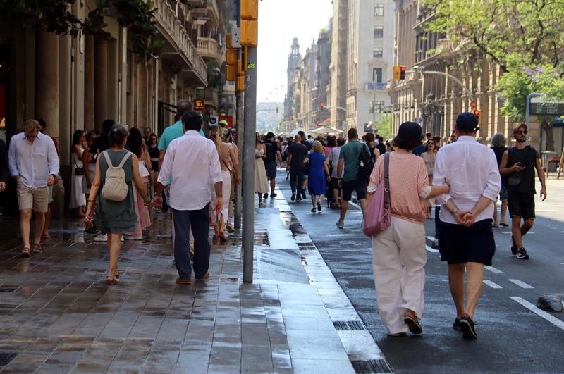 People walking down Via Laietana in Barcelona