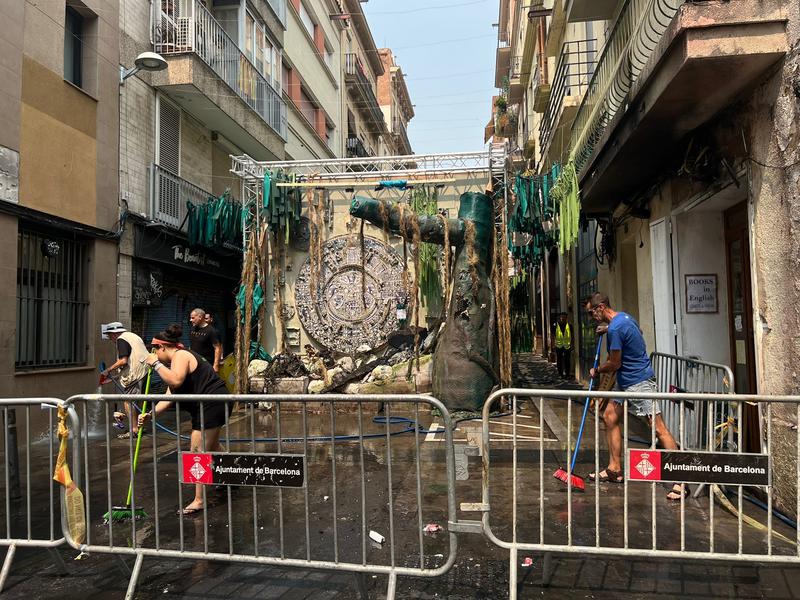 The burned down remains of the decorations of Carrer Verdi