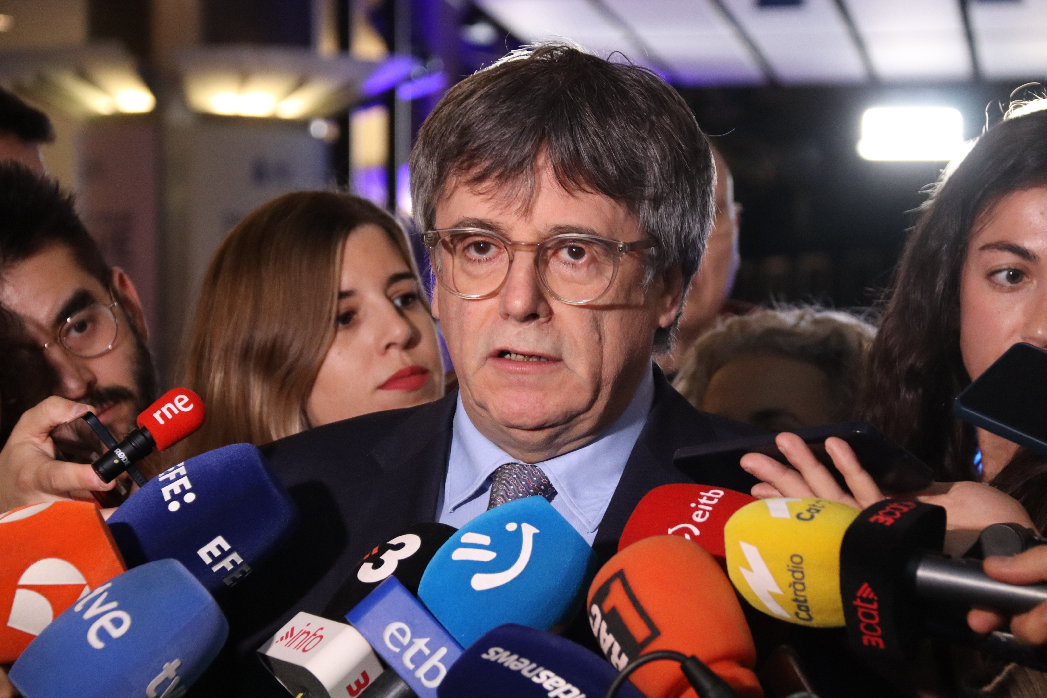 Former Catalan president Carles Puigdemont addresses the media at the European Parliament