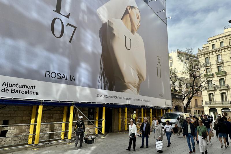A poster in Barcelona announces the upcoming album of Rosalía, Lux