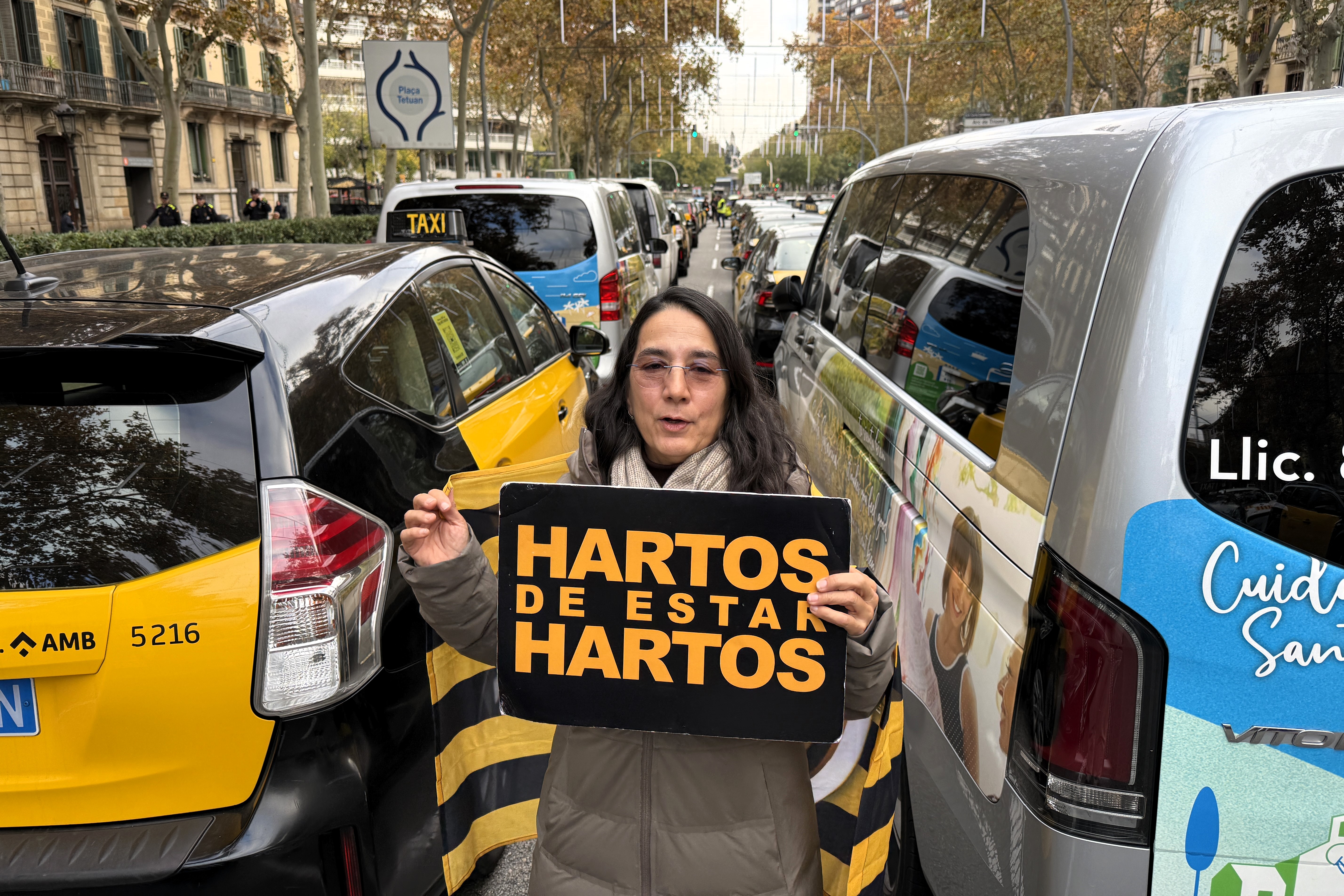 A taxi driver protests against ride-hailing services during a taxi strike on December 9, 2025