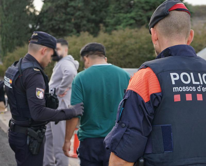 Catalonia's Mossos d'Esquadra and Spain's National Police officers take part in a Europe-wide operation