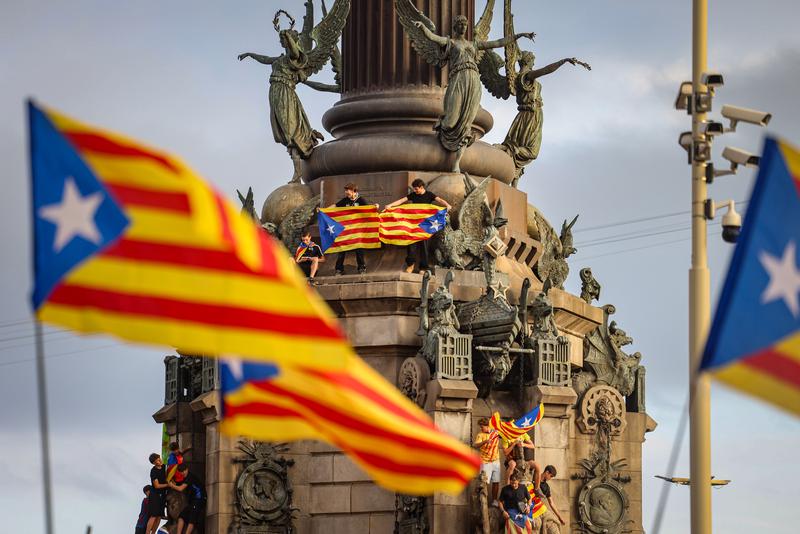 Protesters climbed the Columbus Monument in Barcelona