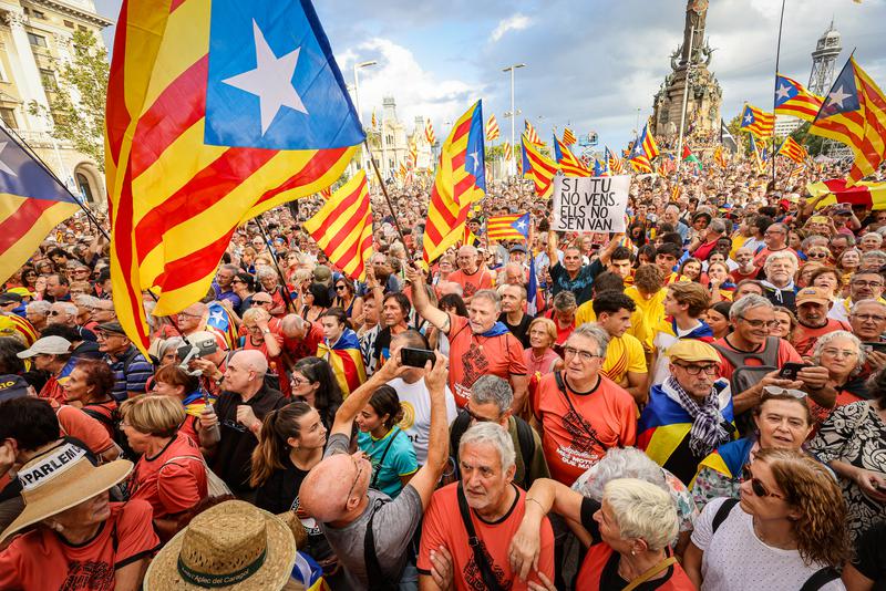 Demonstrators gather in Barcelona's Plaça del Portal de la Pau after a Catalonia's National Day event organised by the ANC, Òmnium Cultural and other organisations