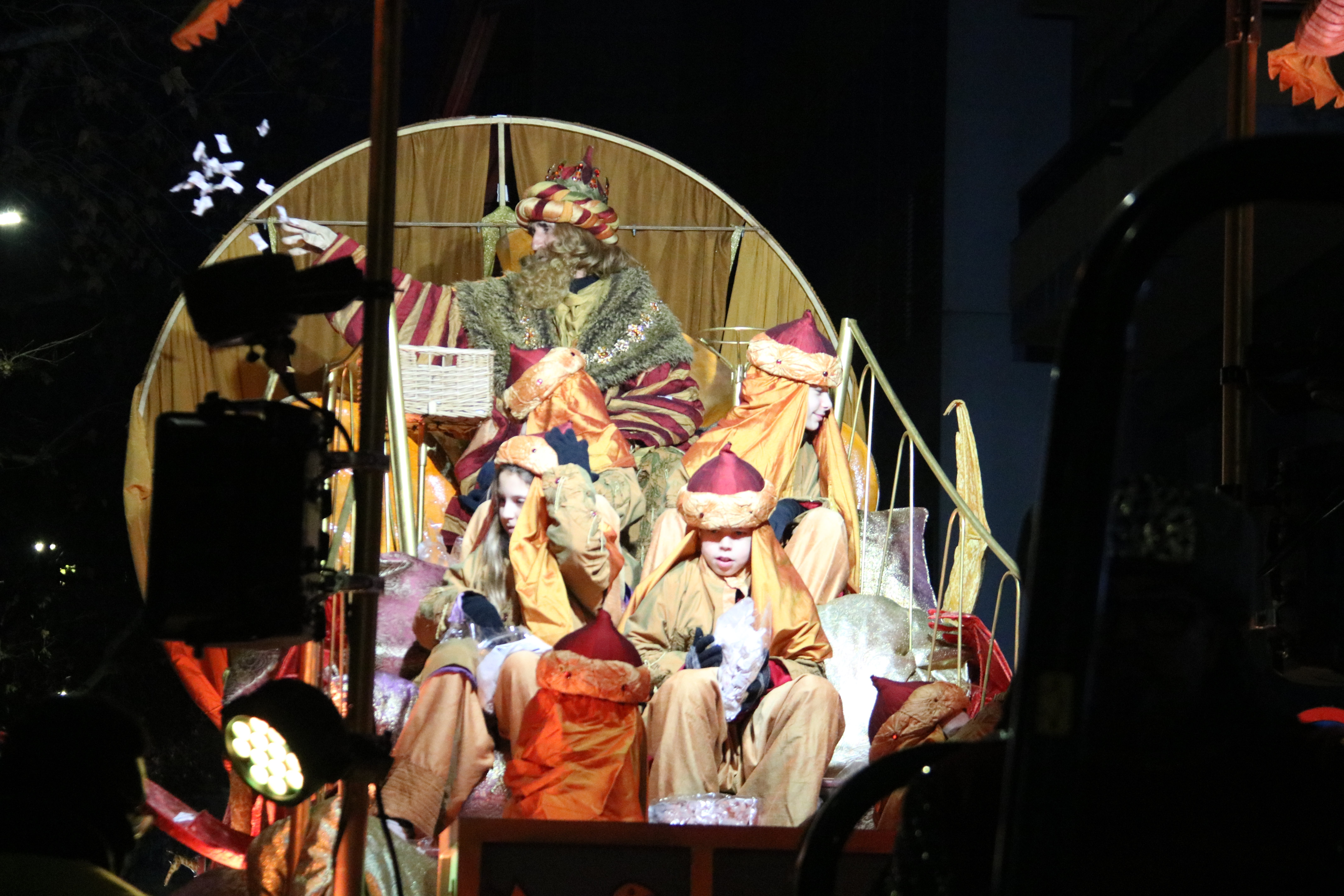 King Gaspar throws candies from his float during the parade in Lleida