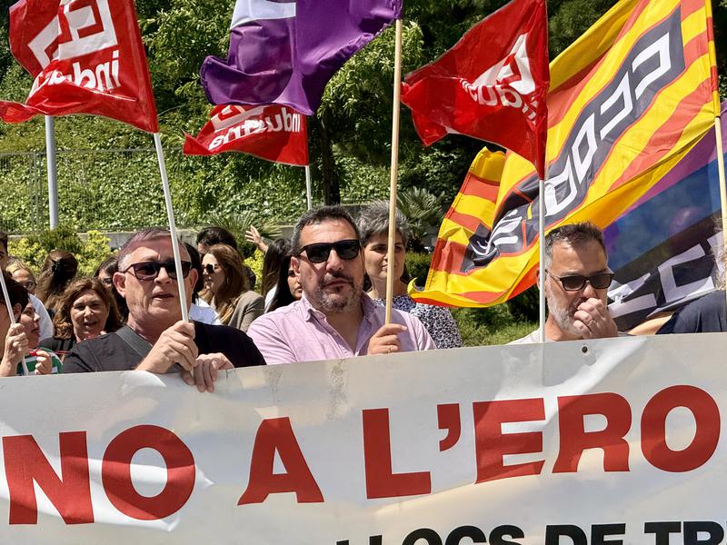 Workers protesting against layoffs