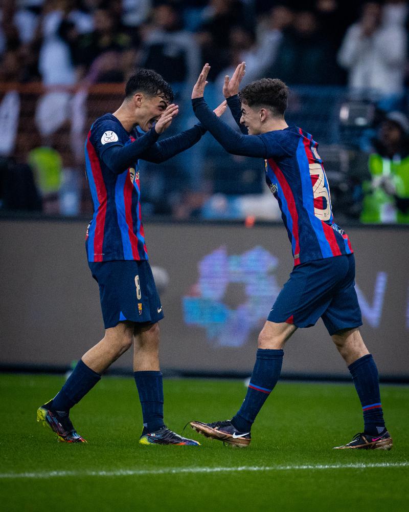 Pedri and Gavi celebrate after combining to put Barça 3-0 up in the Super Cup final