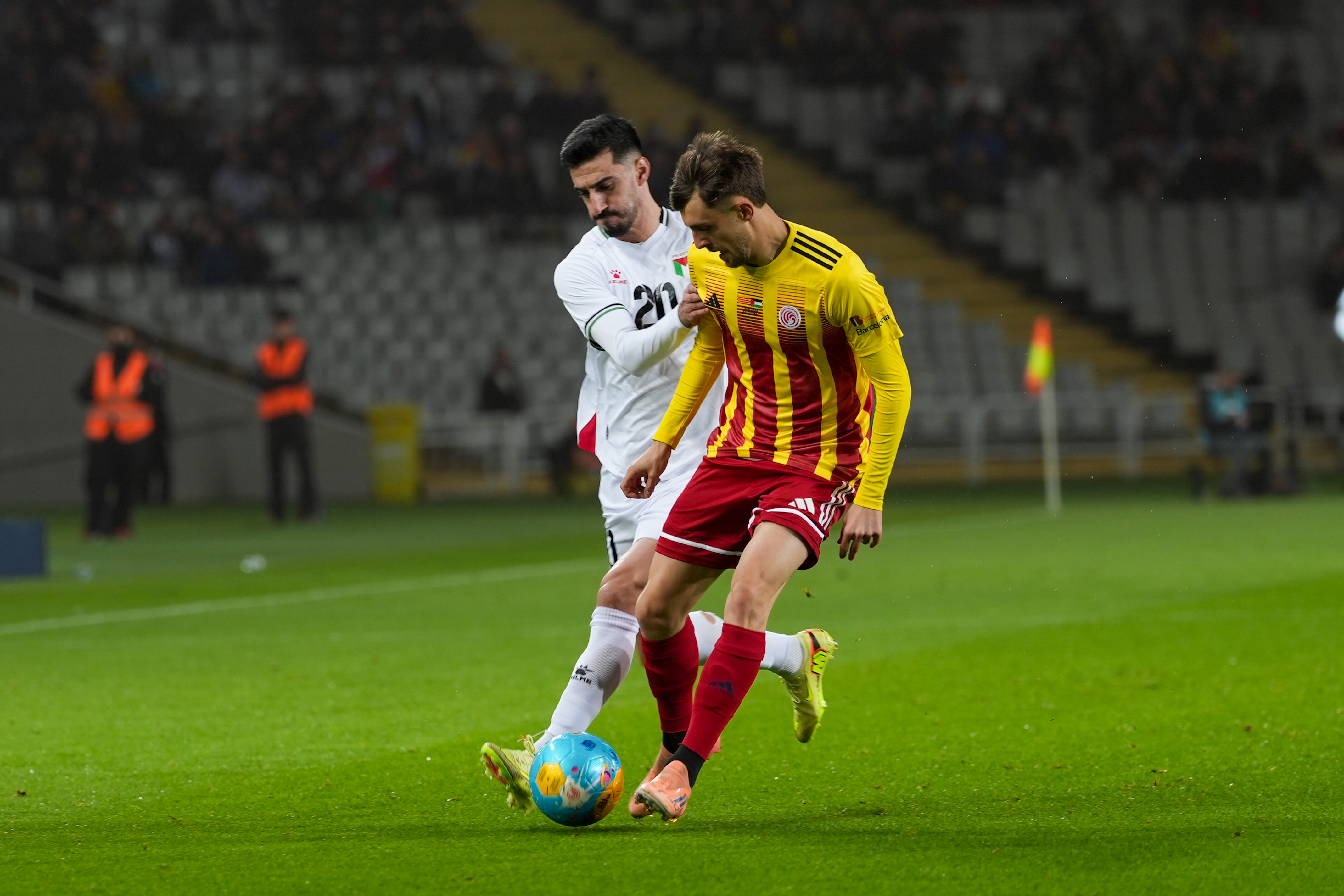 Action from the Catalonia-Palestine match at Barcelona’s Olympic Stadium