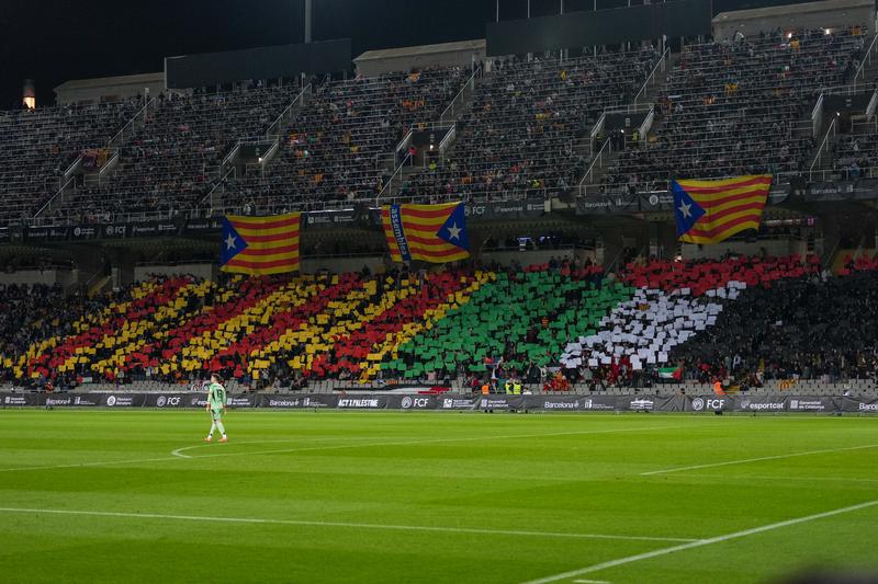 Catalonia and Palestine flags at Barcelona's Olympic Stadium during the Catalonia-Palestine friendly