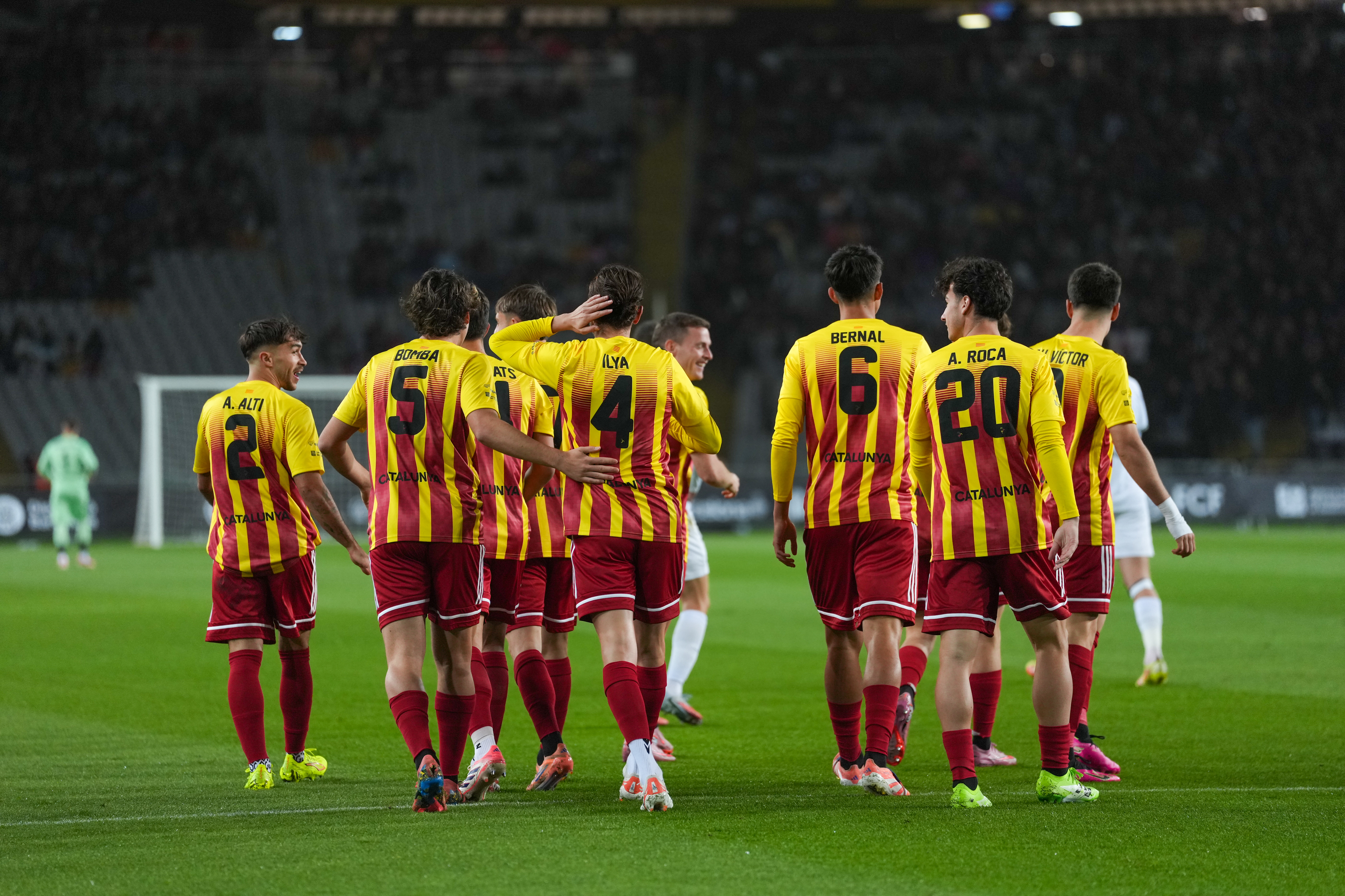 Action from the Catalonia-Palestine match at Barcelona’s Olympic Stadium