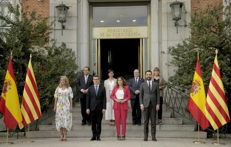 Members of the Spanish and Catalan governments pose for a photo ahead of a dialogue table meeting in July 2022