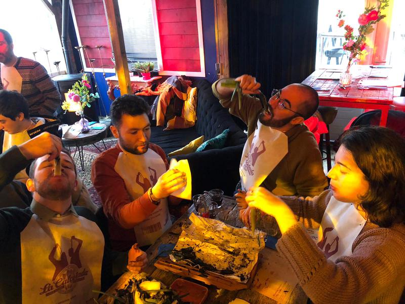 People enjoying a calçotada in Amsterdam 