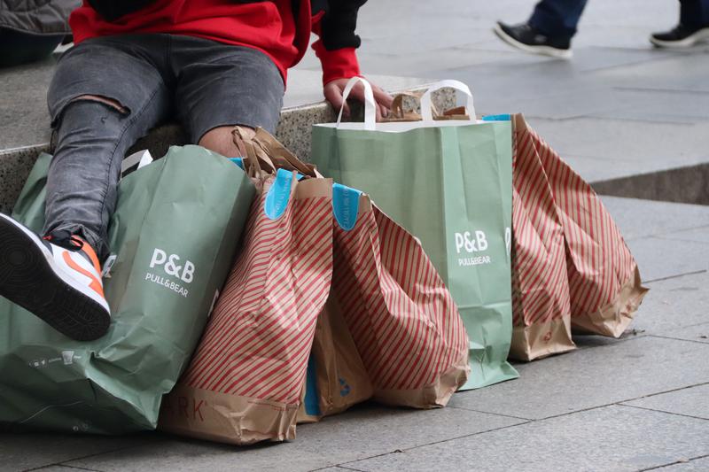 several store bags on the floor on November 25, 2022 coinciding with Black Friday