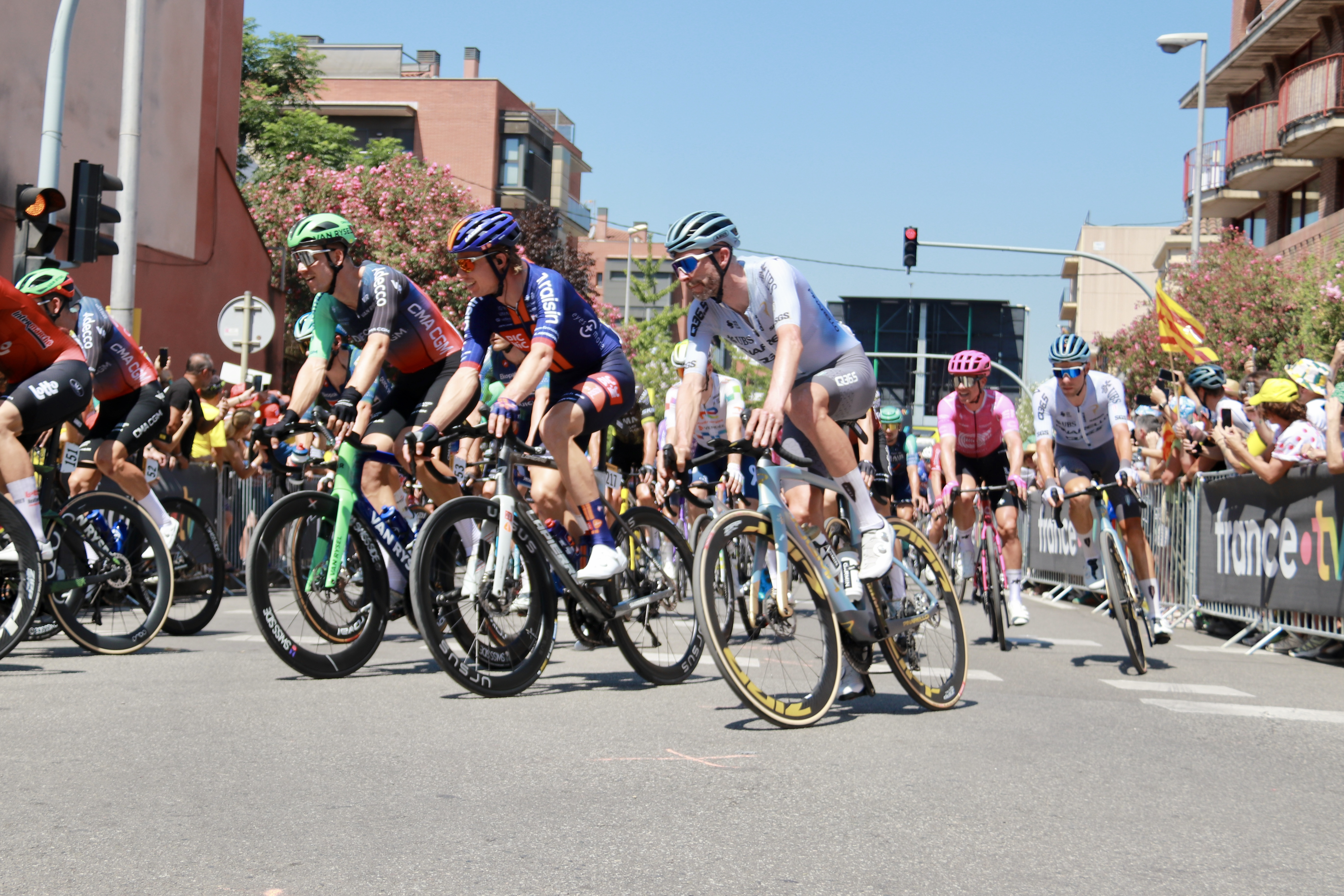 The racers of the Tour de France in the initial stretch of the third stage leaving Granollers.